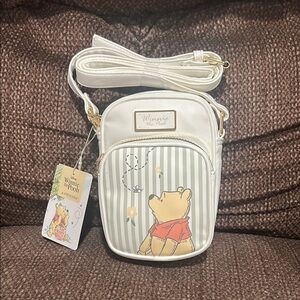 Disney’s Winnie the Pooh Phone Holder from Primark. Brand new with tags.